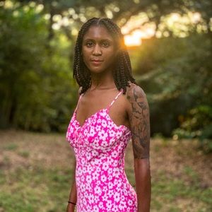 White flowers on pink slip dress